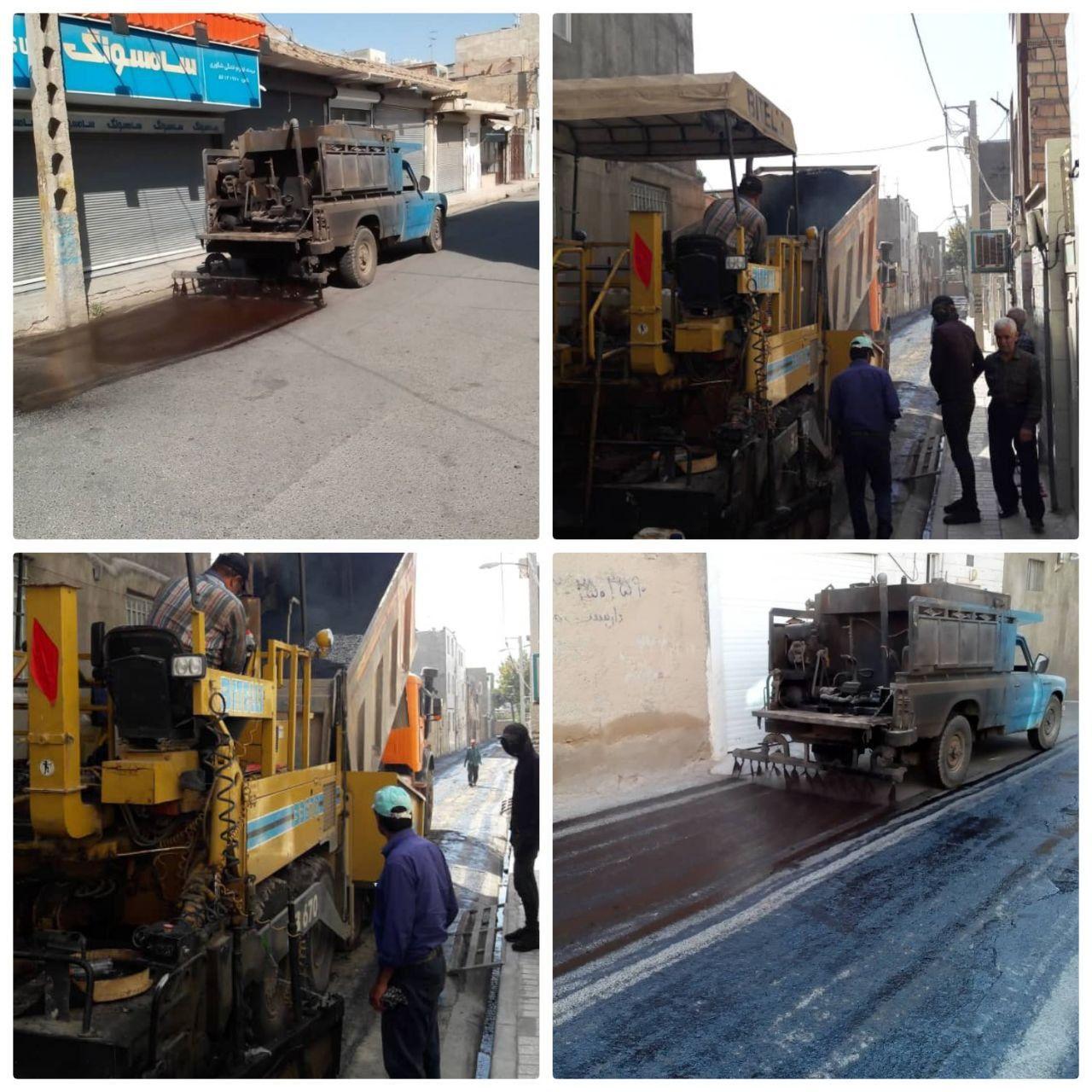 اجرای عملیات روکش مکانیزه آسفالت در شهرک احمدیه منطقه دو
