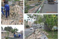 اجرای عملیات تخریب و جمع آوری دیوار محوطه بوستان فدک