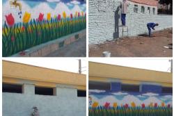 زیباسازی سطح منطقه دو با رنگ آمیزی دیوارهای مدارس