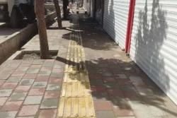 اجرای عملیات همسطح سازی پیاده رو در خیابان علی ابن ابیطالب(ع) در منطقه یک